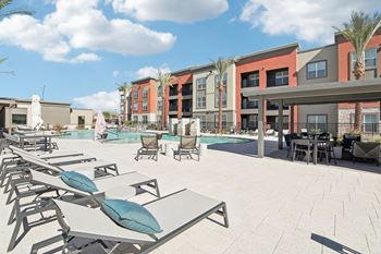 Poolside Relaxing Chairs at The Maddox Luxury Apartment Homes, Buckeye, Arizona